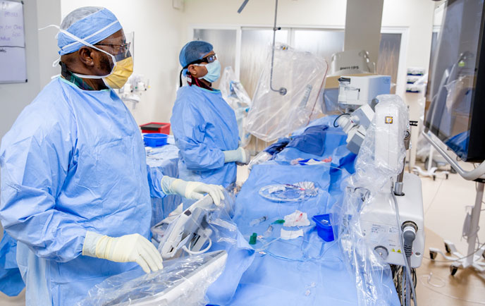 Heart surgeons in a operating room