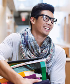 student with books