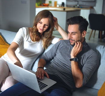 woman and man with laptop