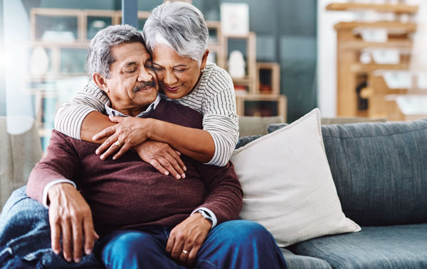 older couple hugging