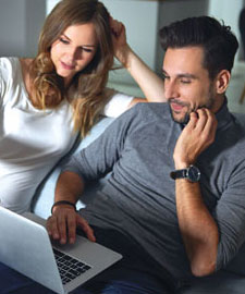 woman and man with laptop