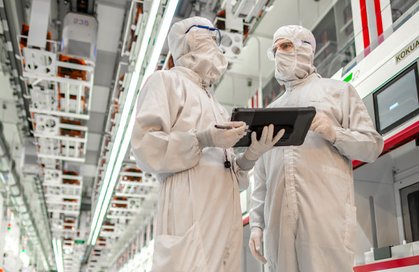 Two people in clean room